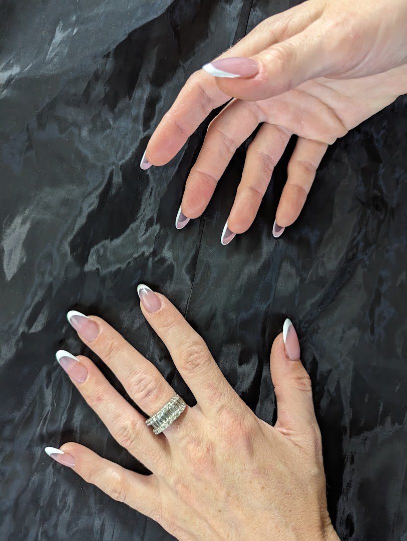 Nail salon stations with manicure tools